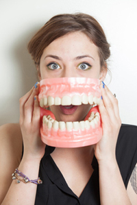 Woman false teeth